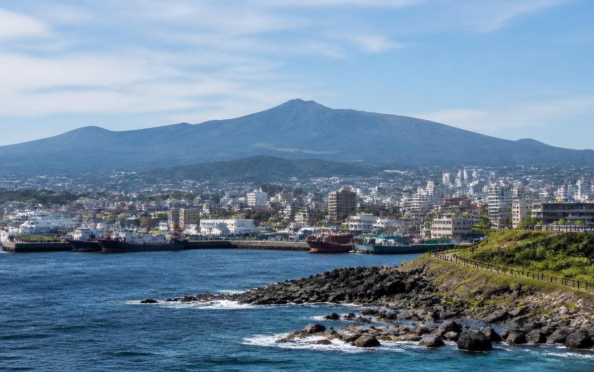 Jeju City harbour with Mount Hallasan behind